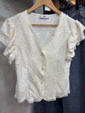 Blouse à manches volantées